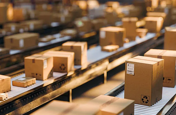 Parcels moving along a conveyor in a distribution centre