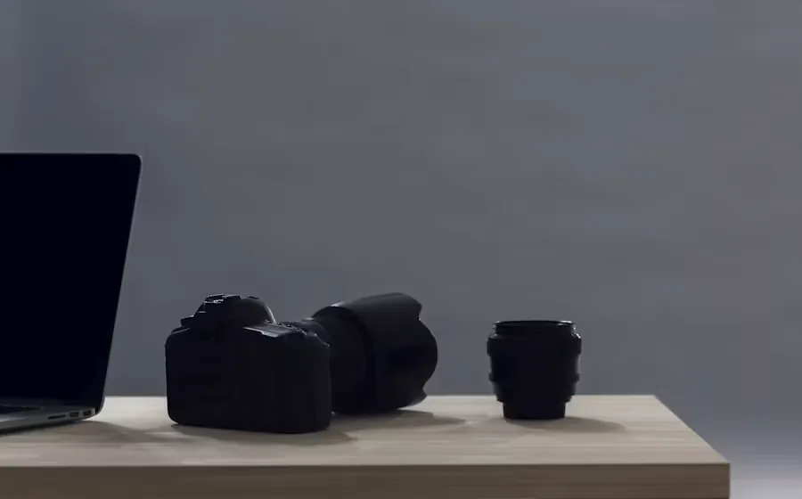 A camera lens standing on a desk