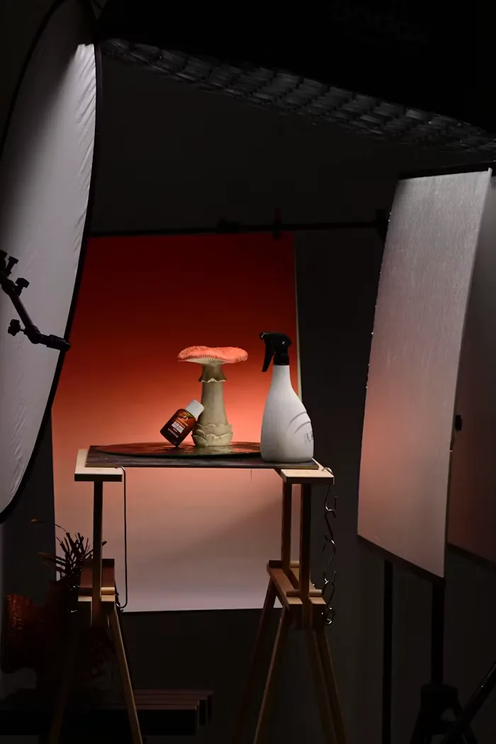 A small product set lit in a darkened studio