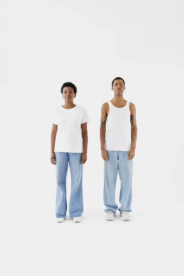 Two people modelling plain white tees